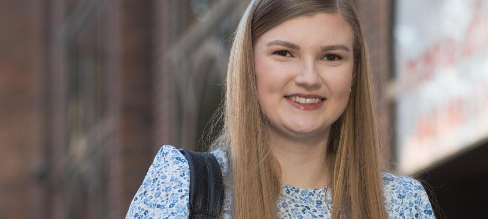 Sarah Wood outside her workplace