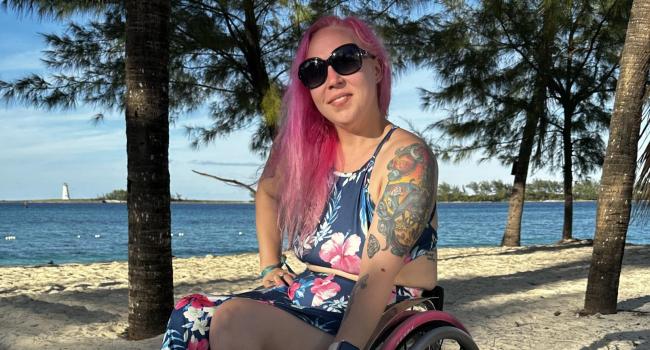 Brianna Paauwe in her wheelchair at the beach