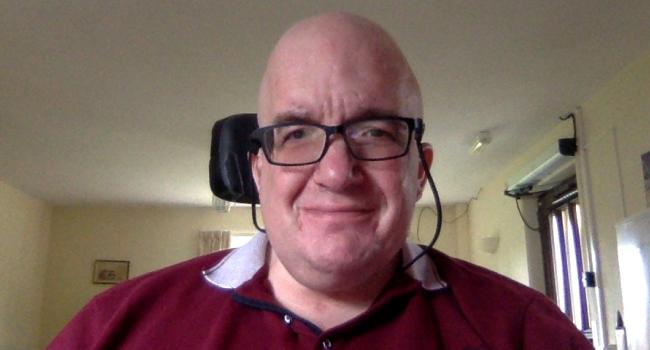 A selfie of Mark Duthoit in his wheelchair
