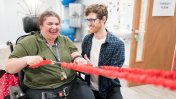 Gloucestershire House Supported Living resident Kay Torres and physiotherapist Piers Baker