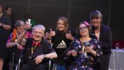 Owen Rowlands and Kayleigh Baynes receiving their award