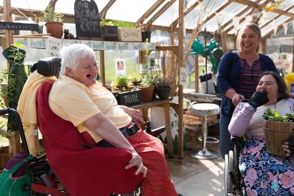 Residents laughing at one of our care homes