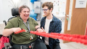 Gloucestershire House Supported Living resident Kay Torres and physiotherapist Piers Baker