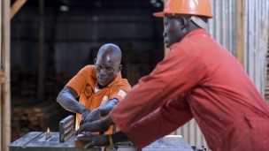 Two men on a construction site