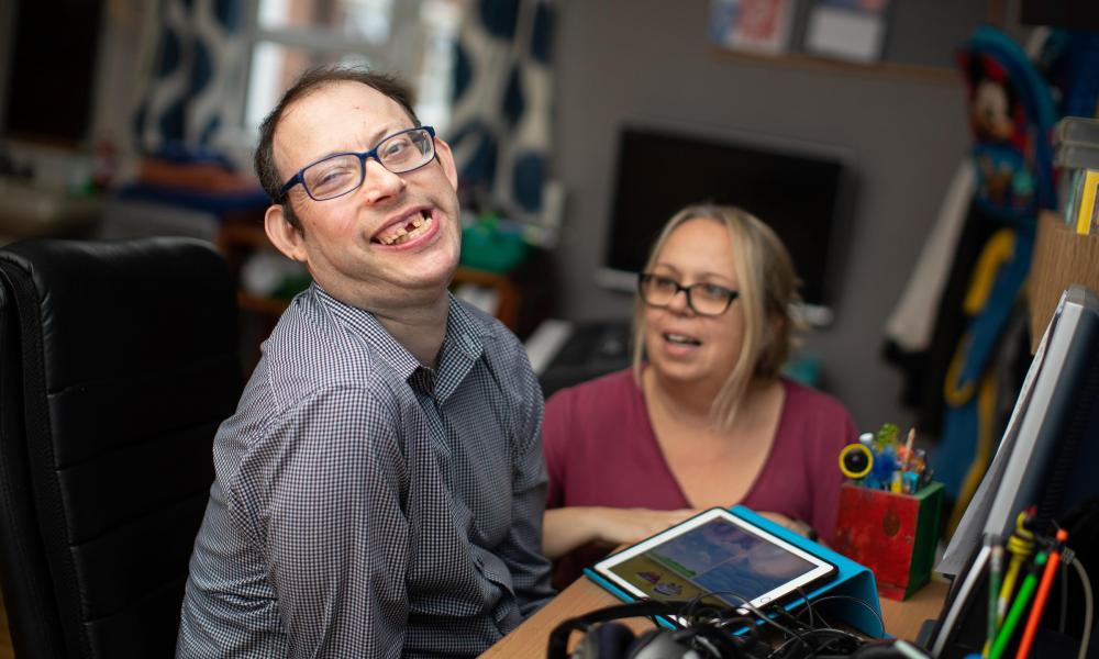 Graham, a resident at Godfrey Robinson House, with Amanda, a member of staff