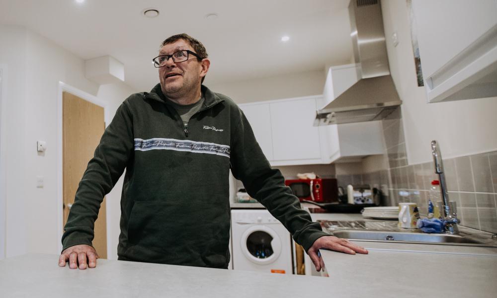 Scott showing off this kitchen at Moray Lodge
