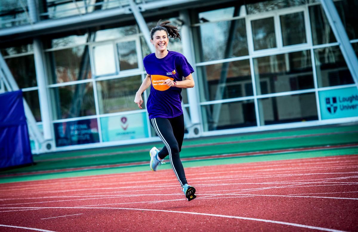 Olivia Breen running on a race track