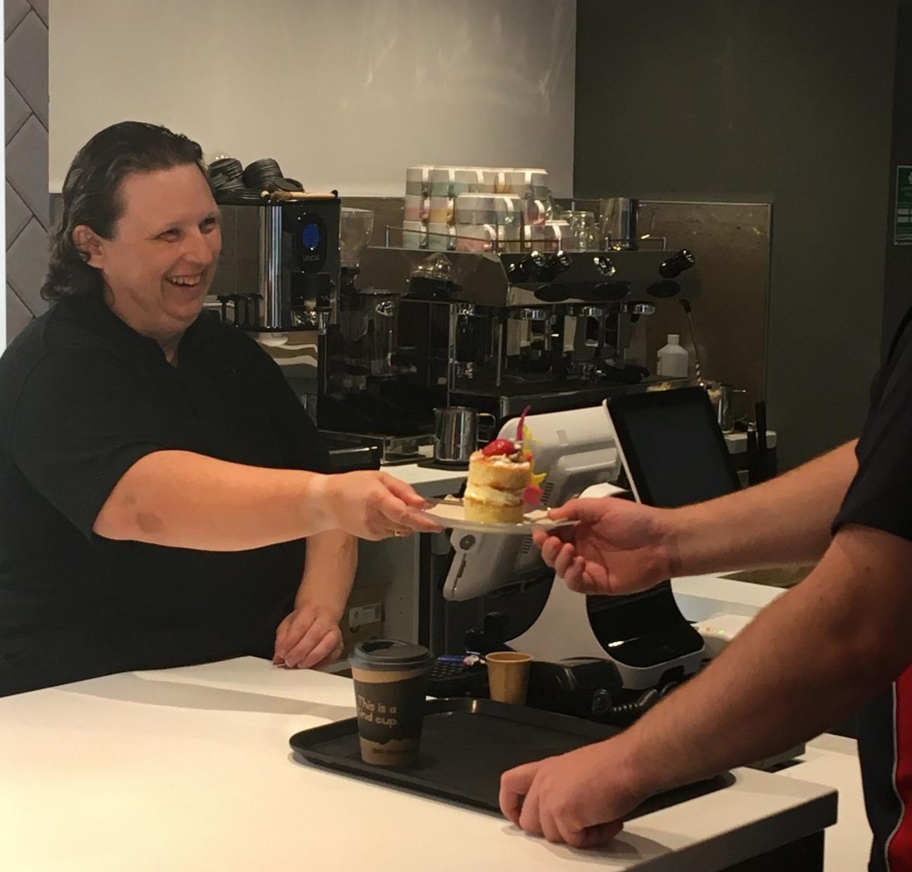 Michelle serving at the social bean