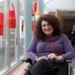 A picture of one of the people who use our service smiling