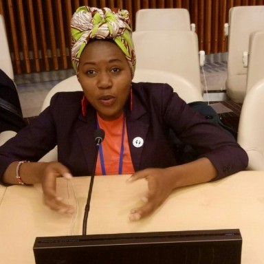 Sarah Musau speaking at a conference