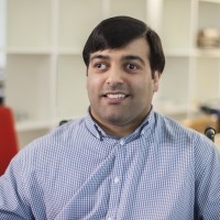 Anil looks at the camera