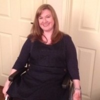 Libby, one of our campaigners, looks at the camera while smiling