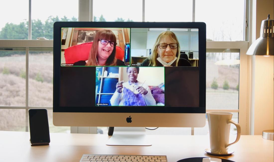 Three people on a zoom call